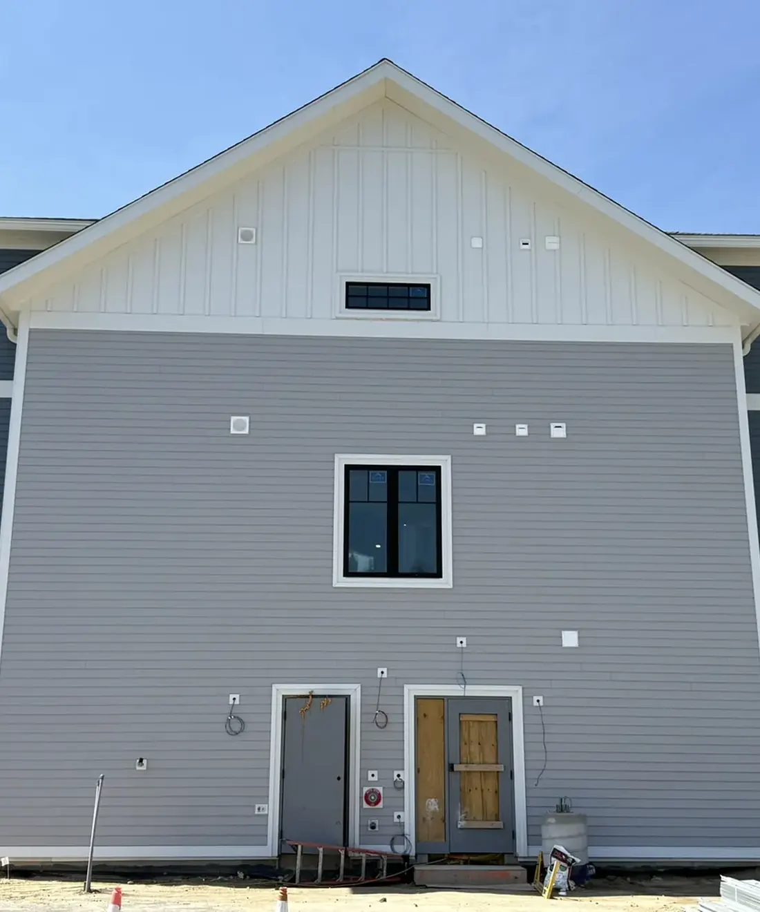 Completed siding on a residential complex