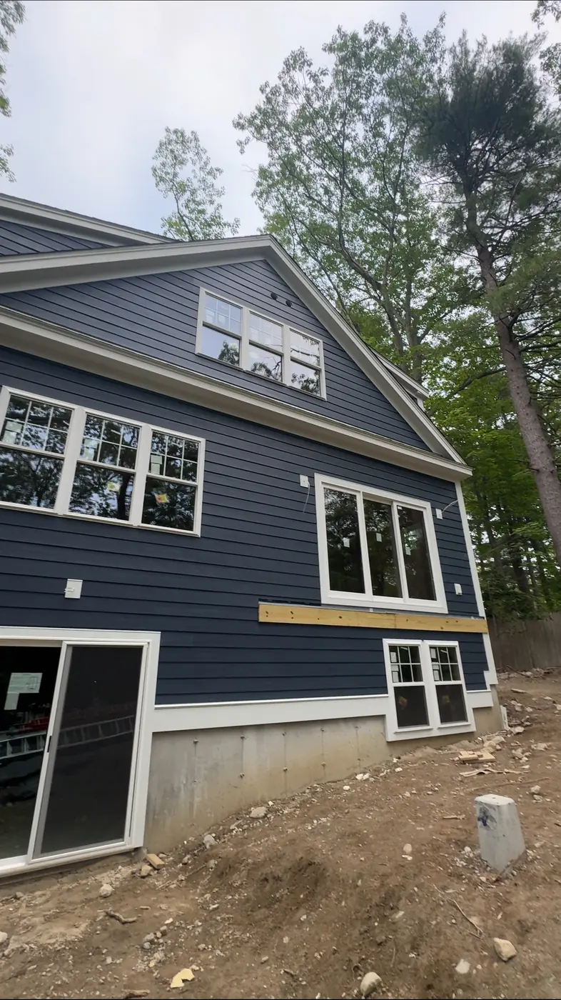 Siding and trim detail on a finished exterior