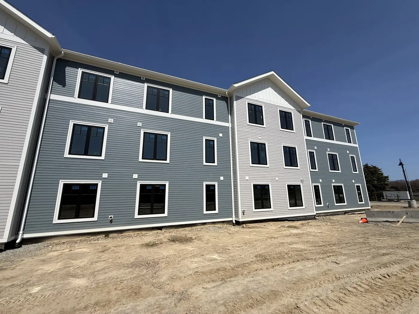 Multifamily exterior after siding replacement