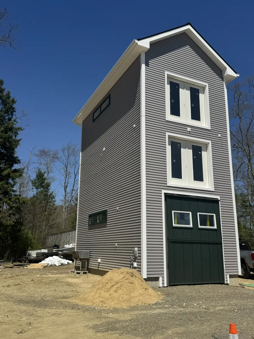Siding installed on a detached structure