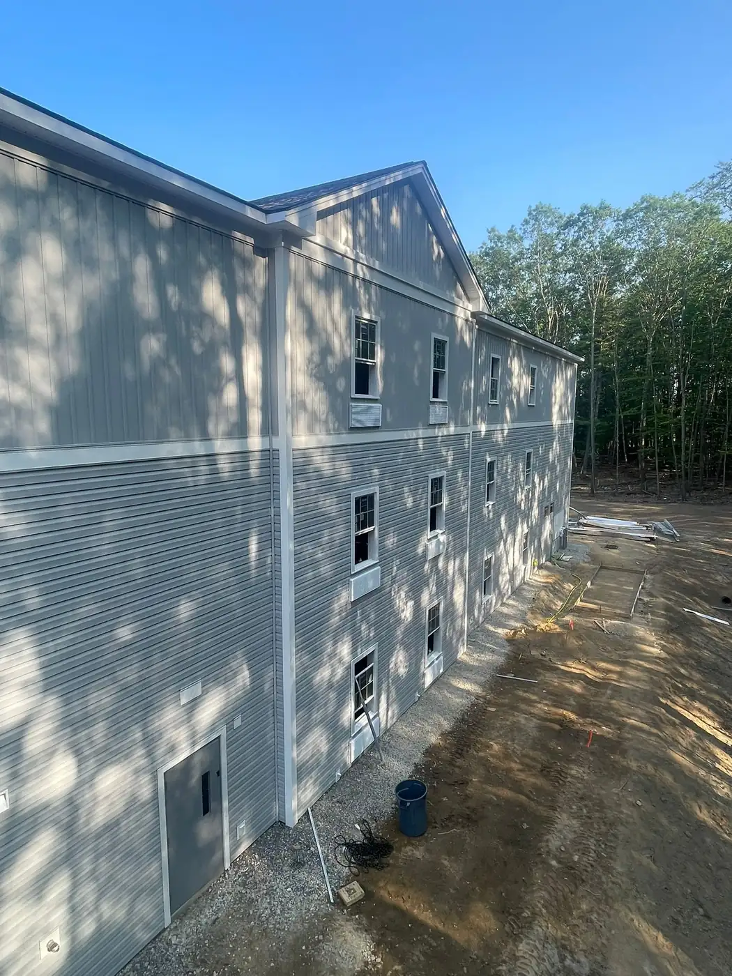 Siding and gutters on a multifamily exterior