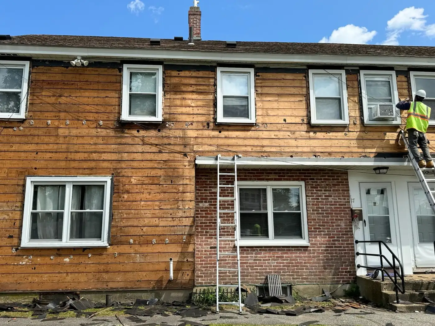 Exterior before siding and trim replacement