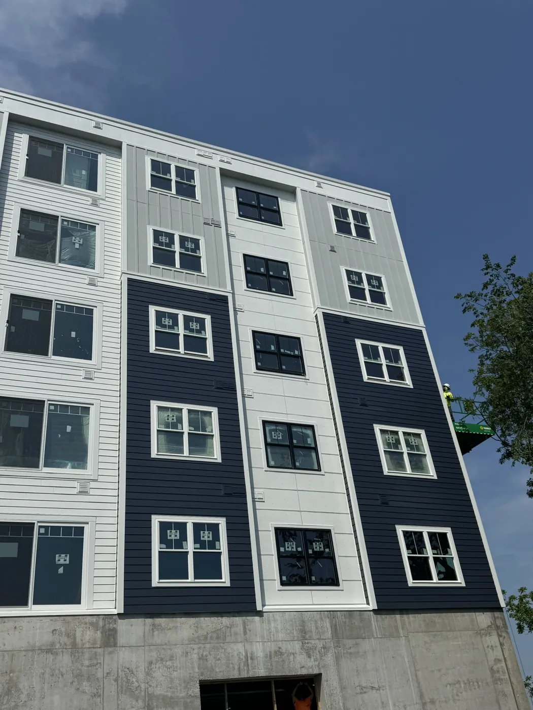 Multi story building during siding installation